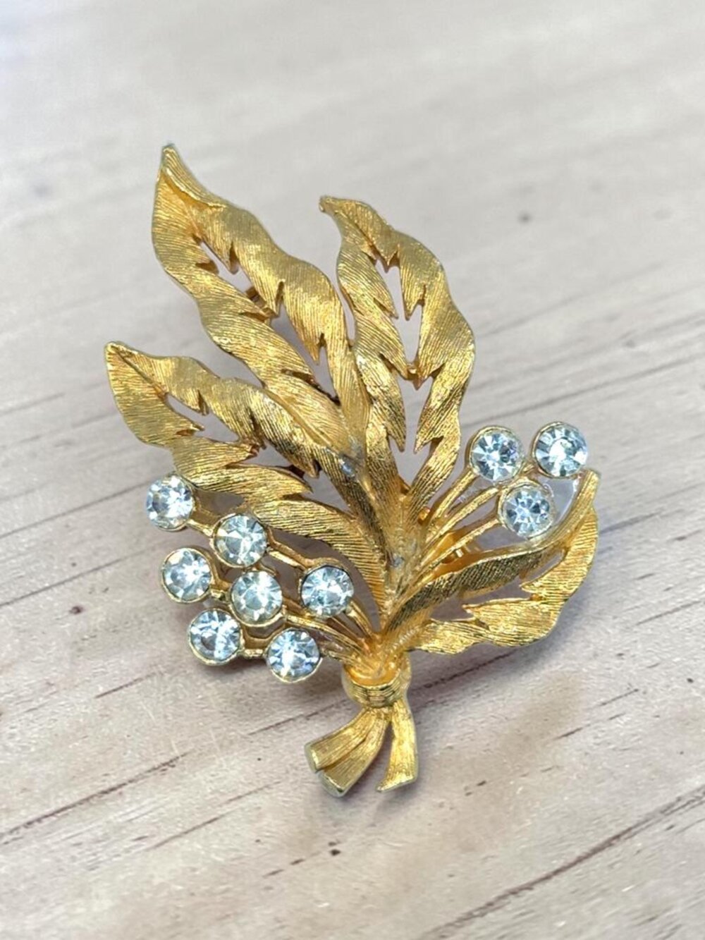 JJ Gold Leaf Brooch with Rhinestone Accents